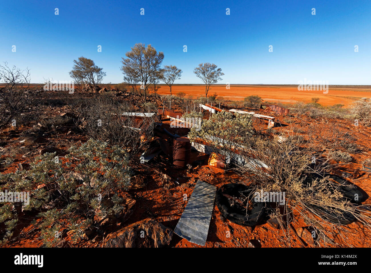Materials left in landscape from a nearby gold mine, Meekathara, Murchison, Western Australia Stock Photo