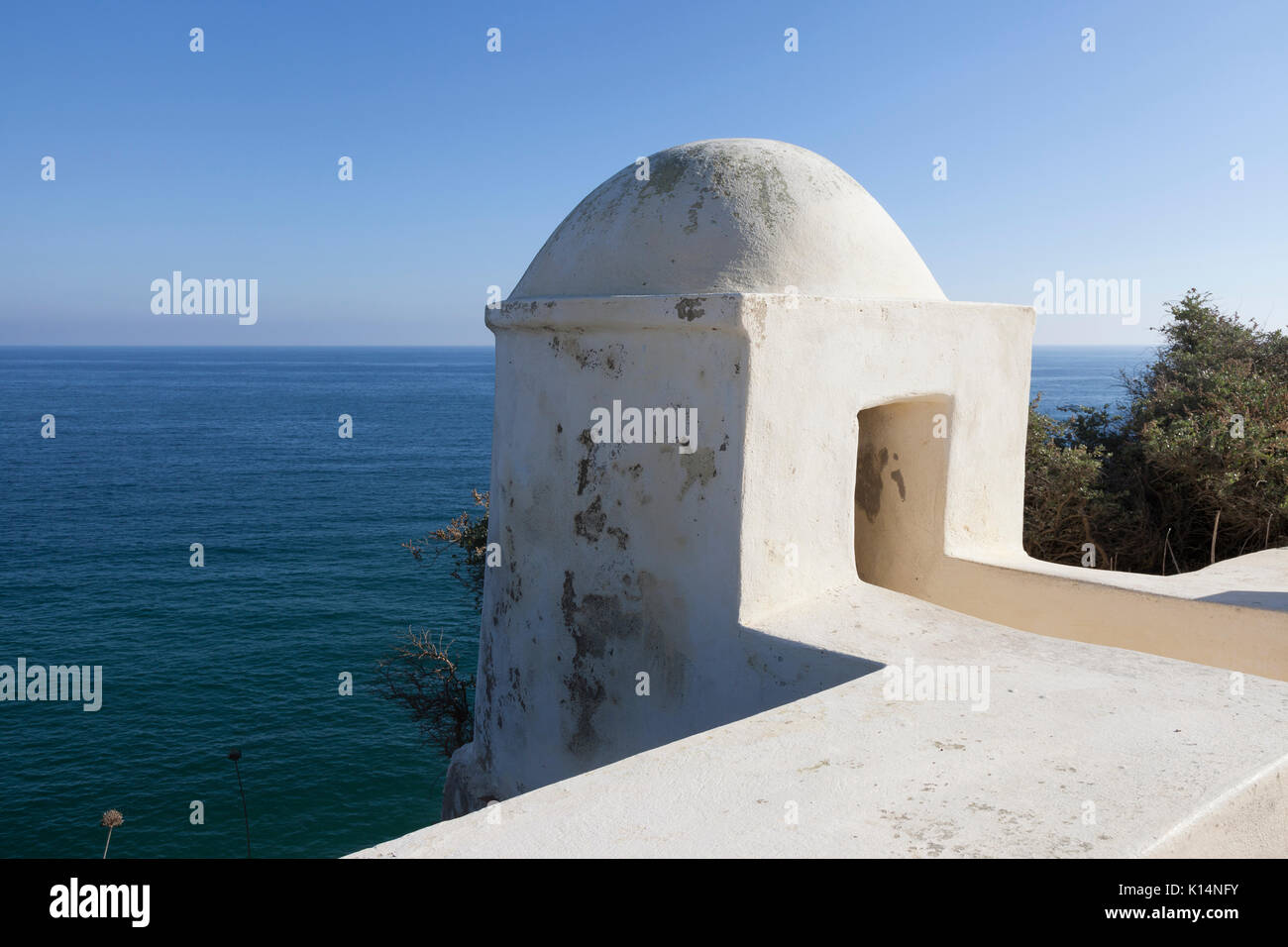 Sagres, Portugal: Lookout tower at the Fortress of Sagres over the Atlantic Ocean. The peninsula of Sagres Point is near the southwestern most point i Stock Photo