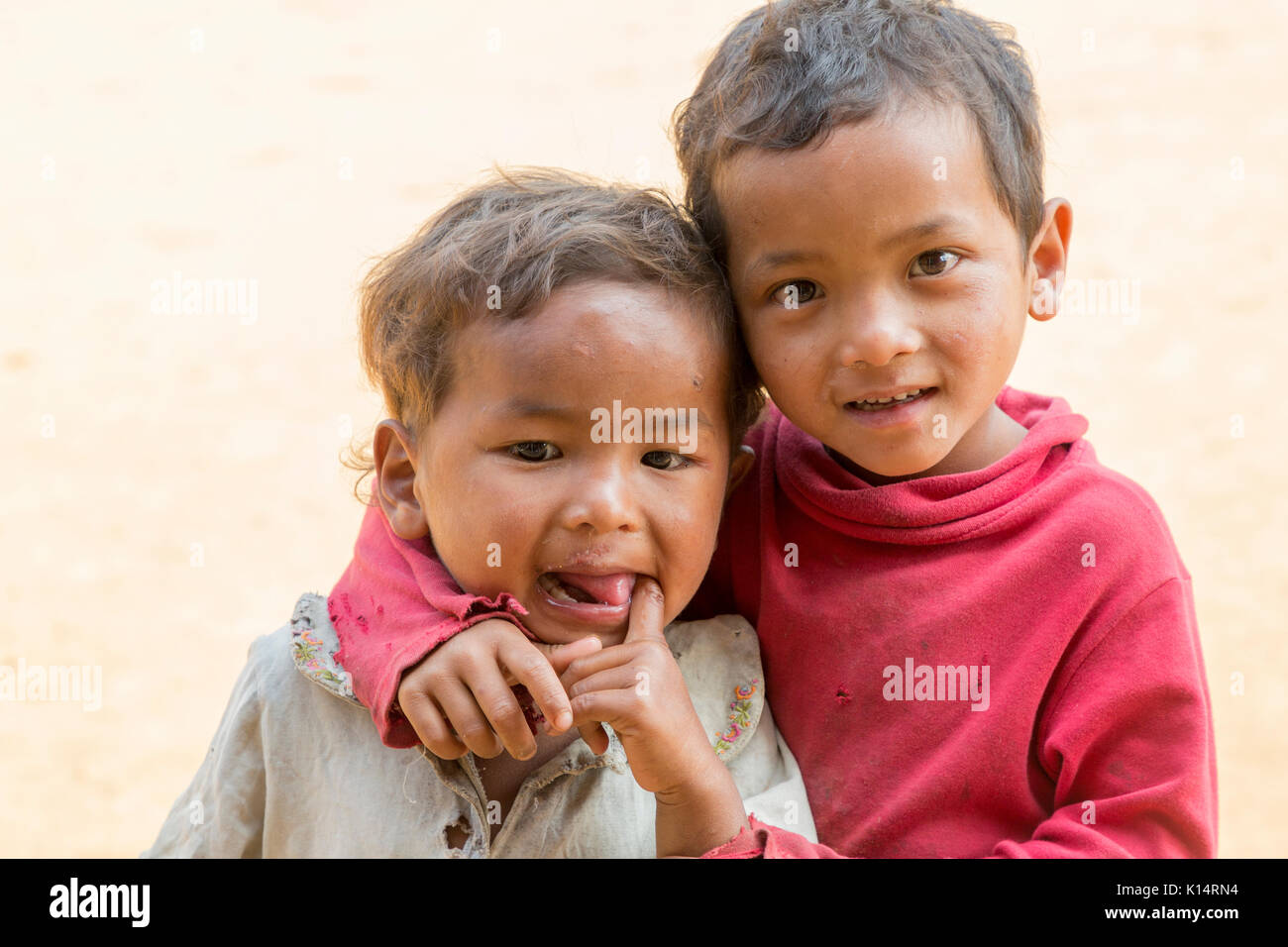 Two dirty children from Sielkan in a remote area of Meghalaya, India Stock Photo