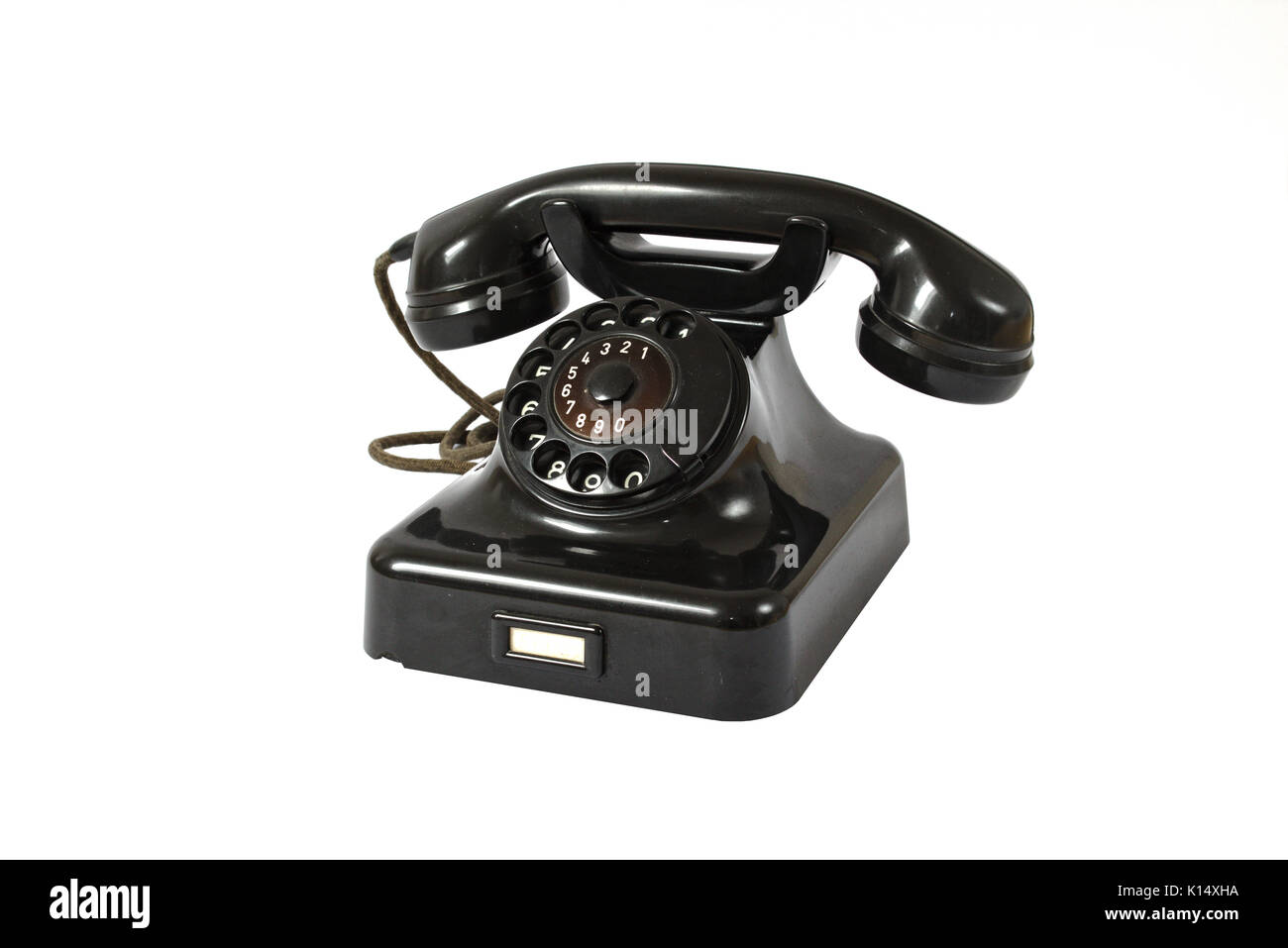 Old black rotary dial telephone Stock Photo