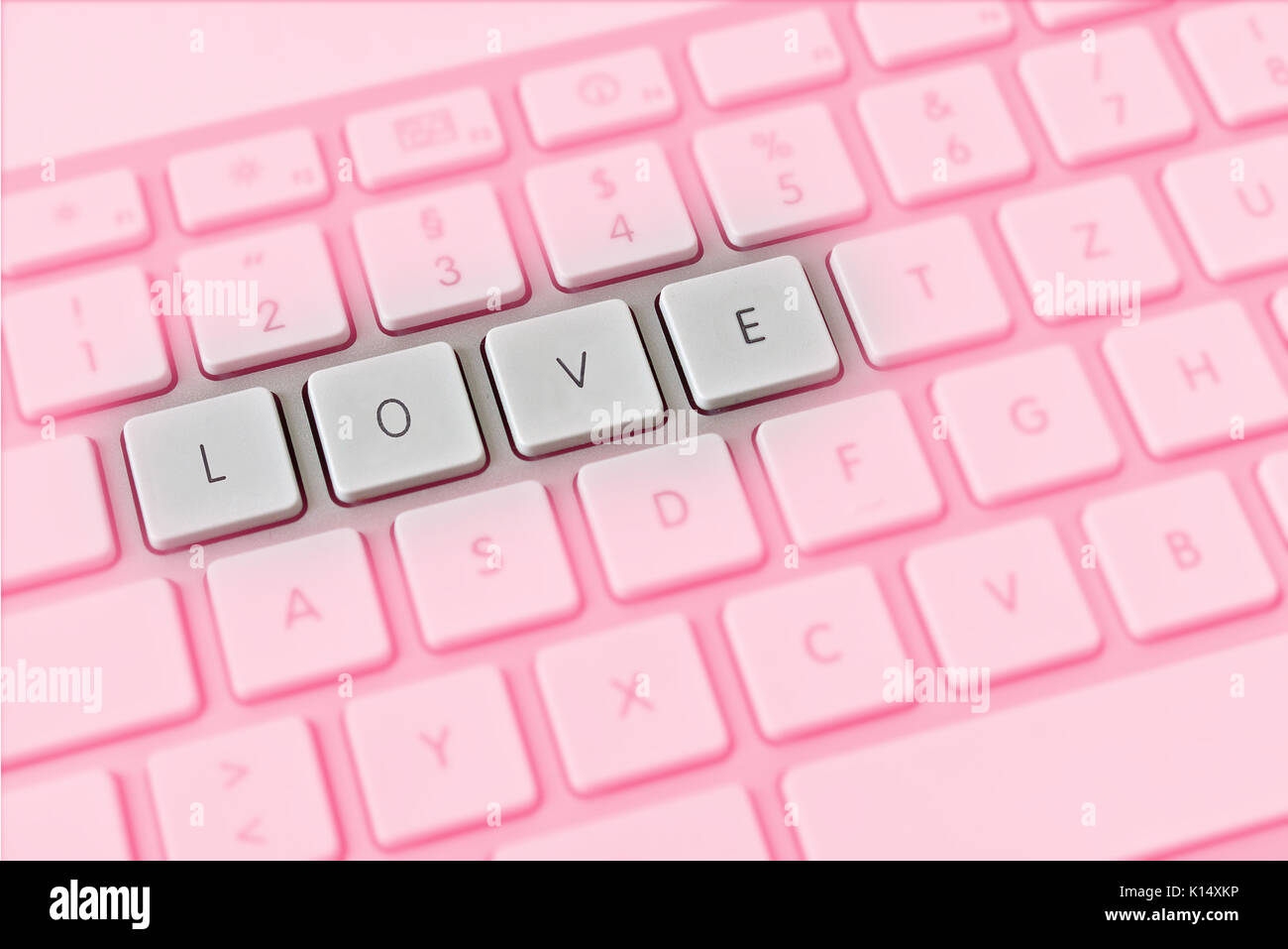 Computer keyboard spelling love instead of QWERTY Stock Photo