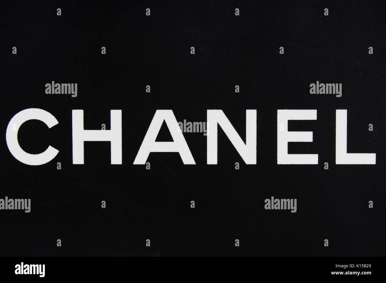 Chanel White Big Logo With Chanel Pattern In Black Background