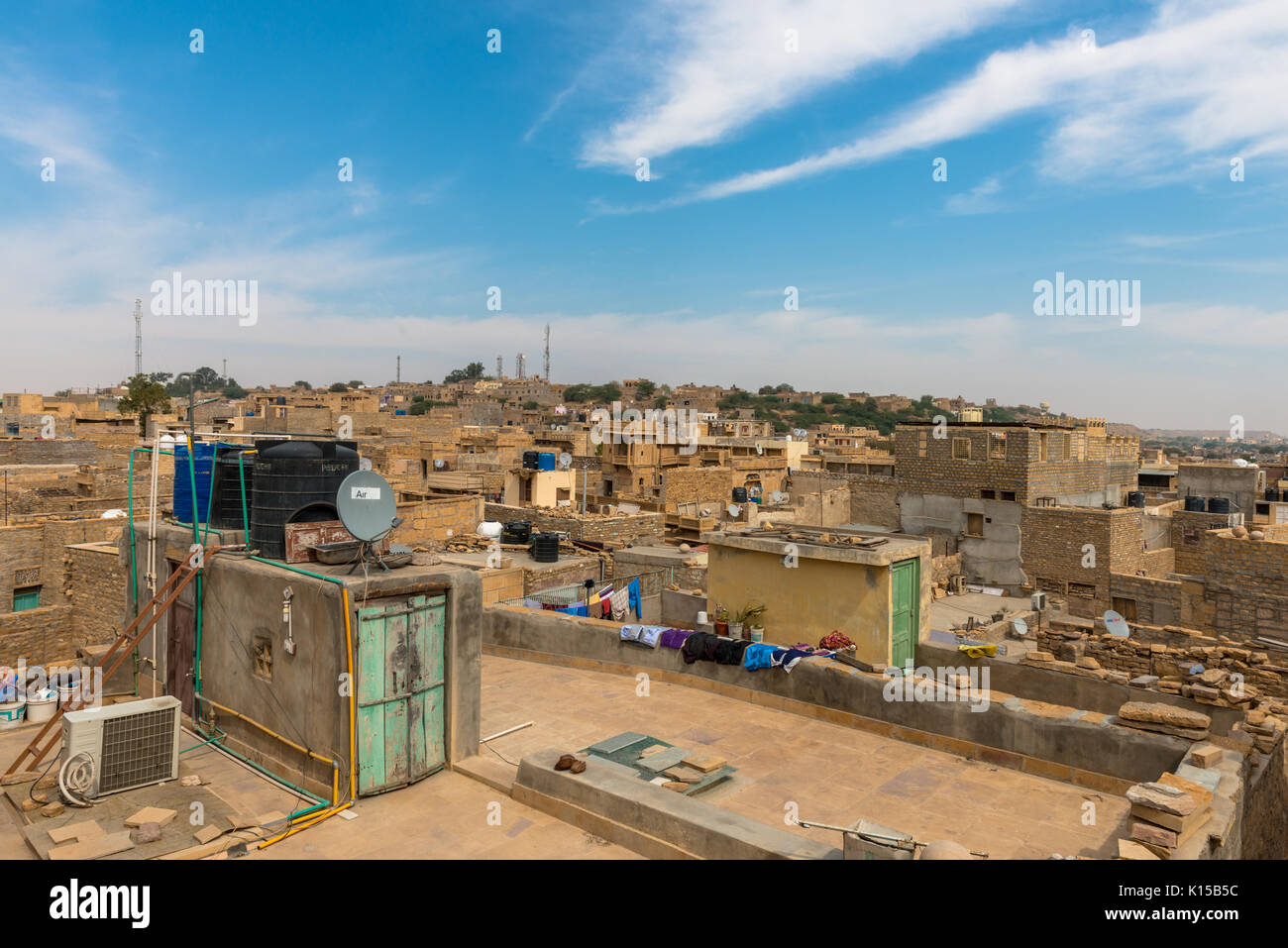 JAISALMER, RAJASTHAN, INDIA - MARCH 07, 2016: Houses view from Saalam Singh Ki Haweli rooftop, carved yellow sandstone architecture in Jaisalmer, know Stock Photo