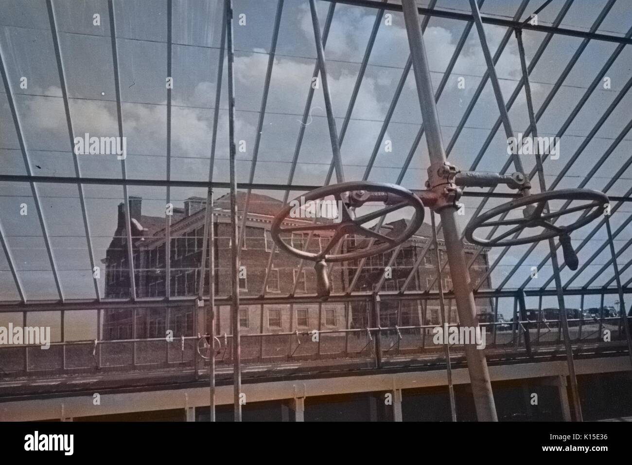 View through top of greenhouse, with control and ventilation apparatus