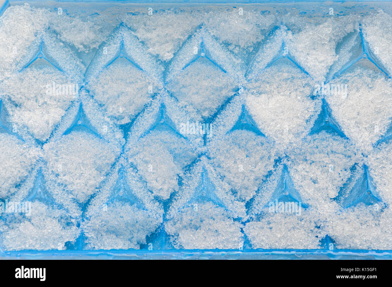 Blue tray for making ice cubes. Stock Photo