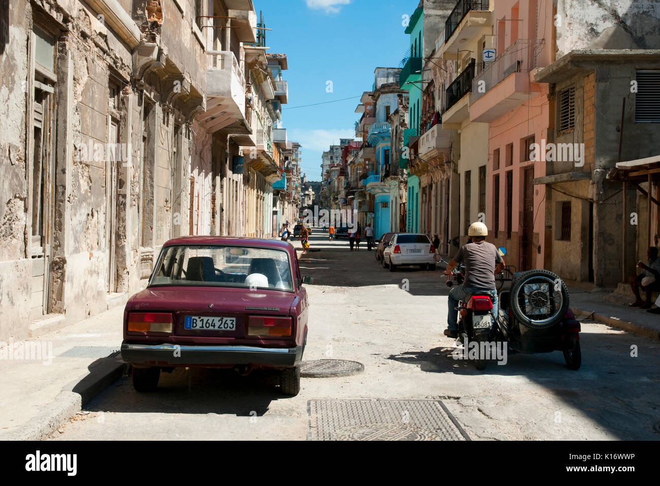HAVANA, CUBA - June 7, 2015: Narrow residential & commercial street in the capital communist nation Stock Photo