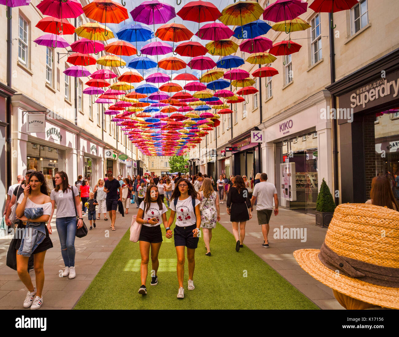8 July 2017: Bath, Somerset, England, UK - Shopping in the SouthGate shopping centre. Above is the city's installation of 1000 umbrellas. Stock Photo