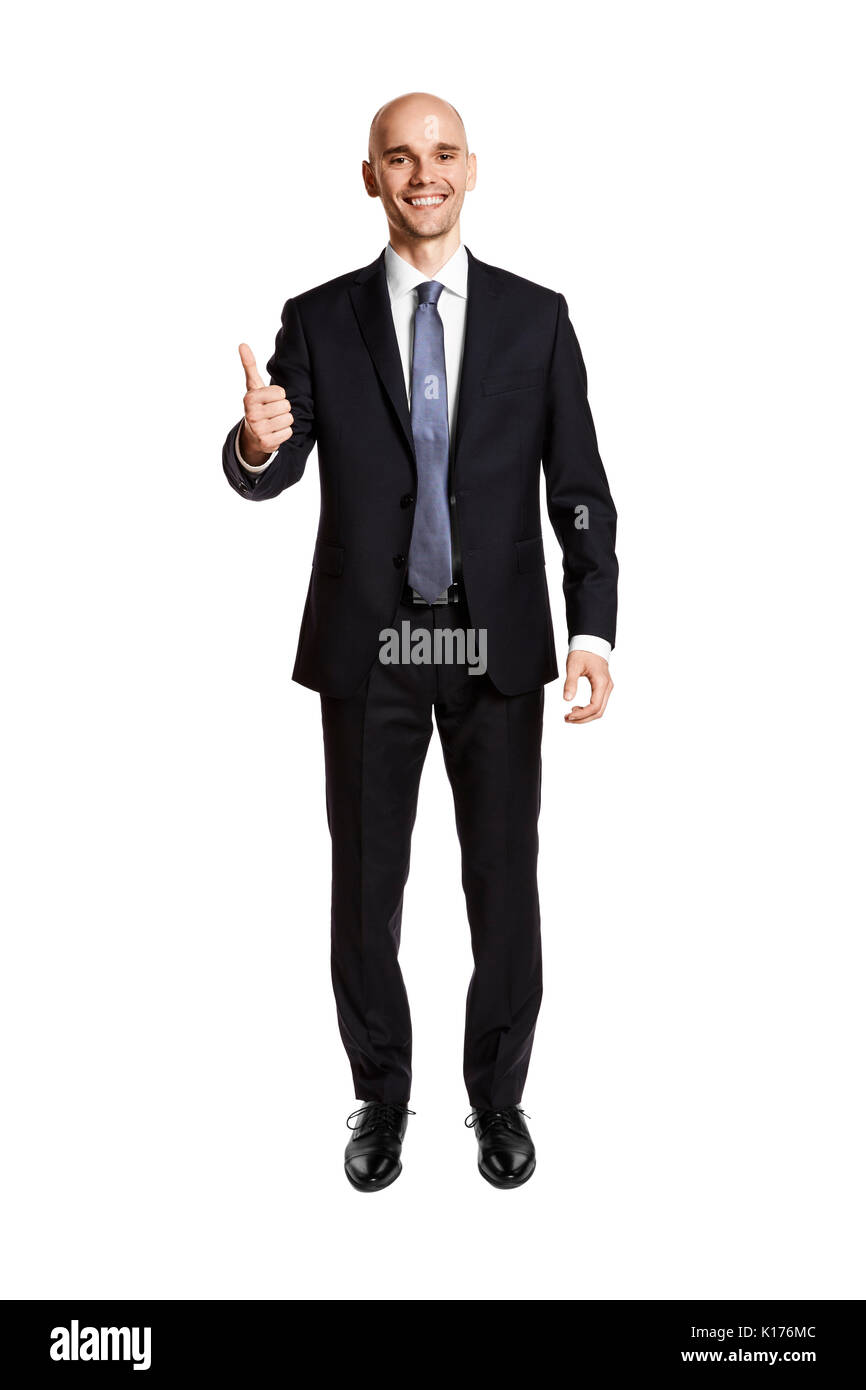 Full lenght studio shot of a satisfied man isolated on white background. Stock Photo