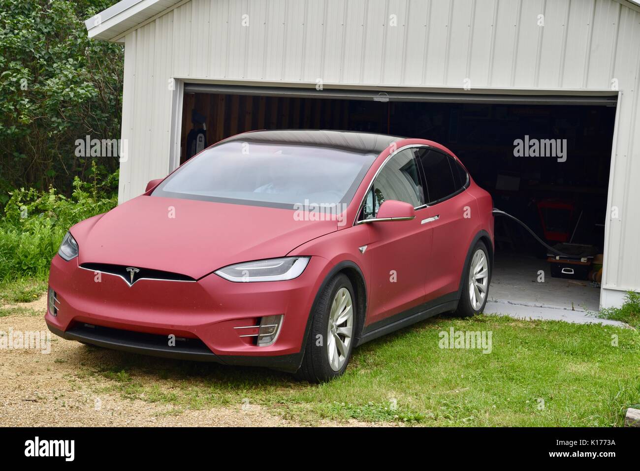 Tesla Model X Cross Over All Electric Vehicle Recharging At