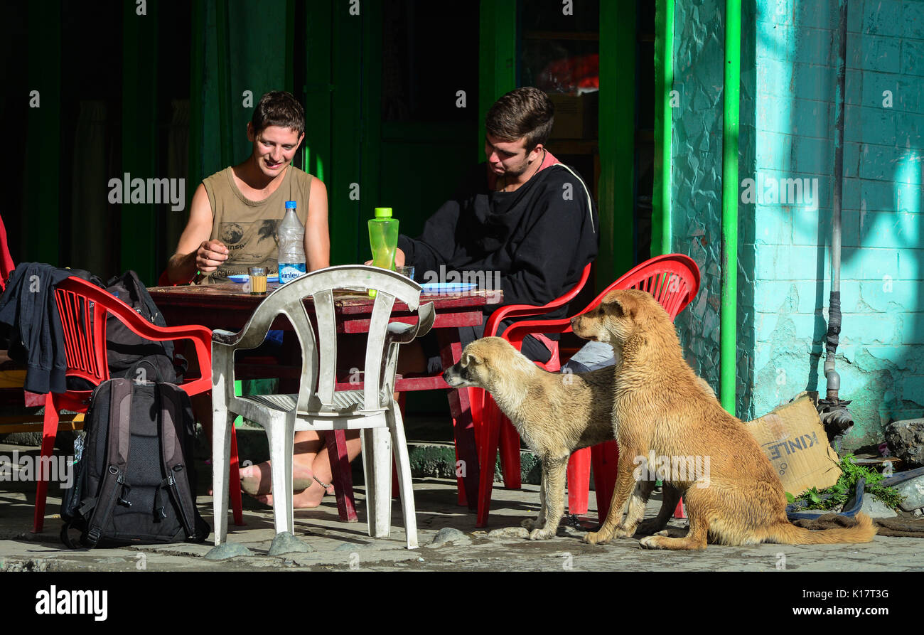 Jammu, India - Jul 23, 2015. People sitting at outdoor coffee shop in Jammu, India. Jammu is the most populous district in the Indian state of Jammu a Stock Photo