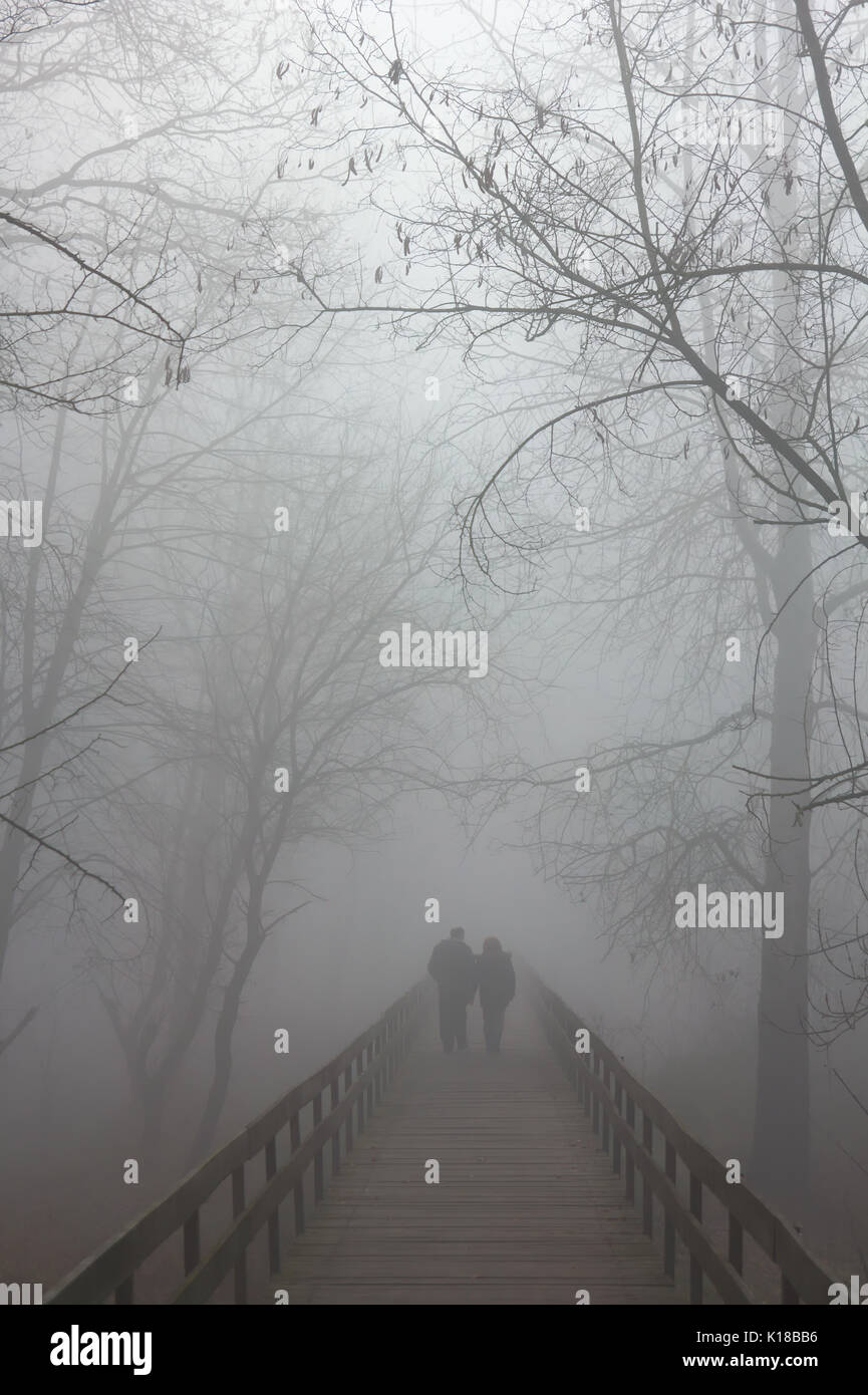 Couple on bridge Stock Photo - Alamy