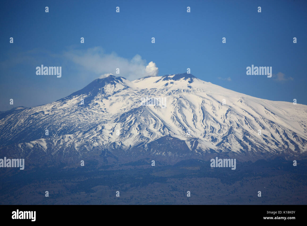 Sicily, the snow-capped peak of volcano Etna Stock Photo
