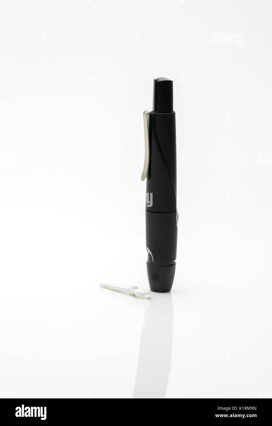 Lancing pen device isolated on white background with copy space Stock Photo