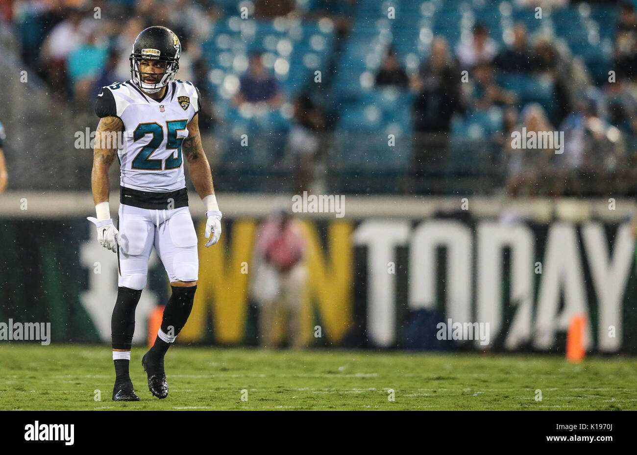 August 24, 2017: Jacksonville Jaguars wide receiver Justin Blackmon (14)  escapes Carolina Panthers cornerback Cole Luke (32) during a punt return in  the second half of an NFL preseason game in Jacksonville