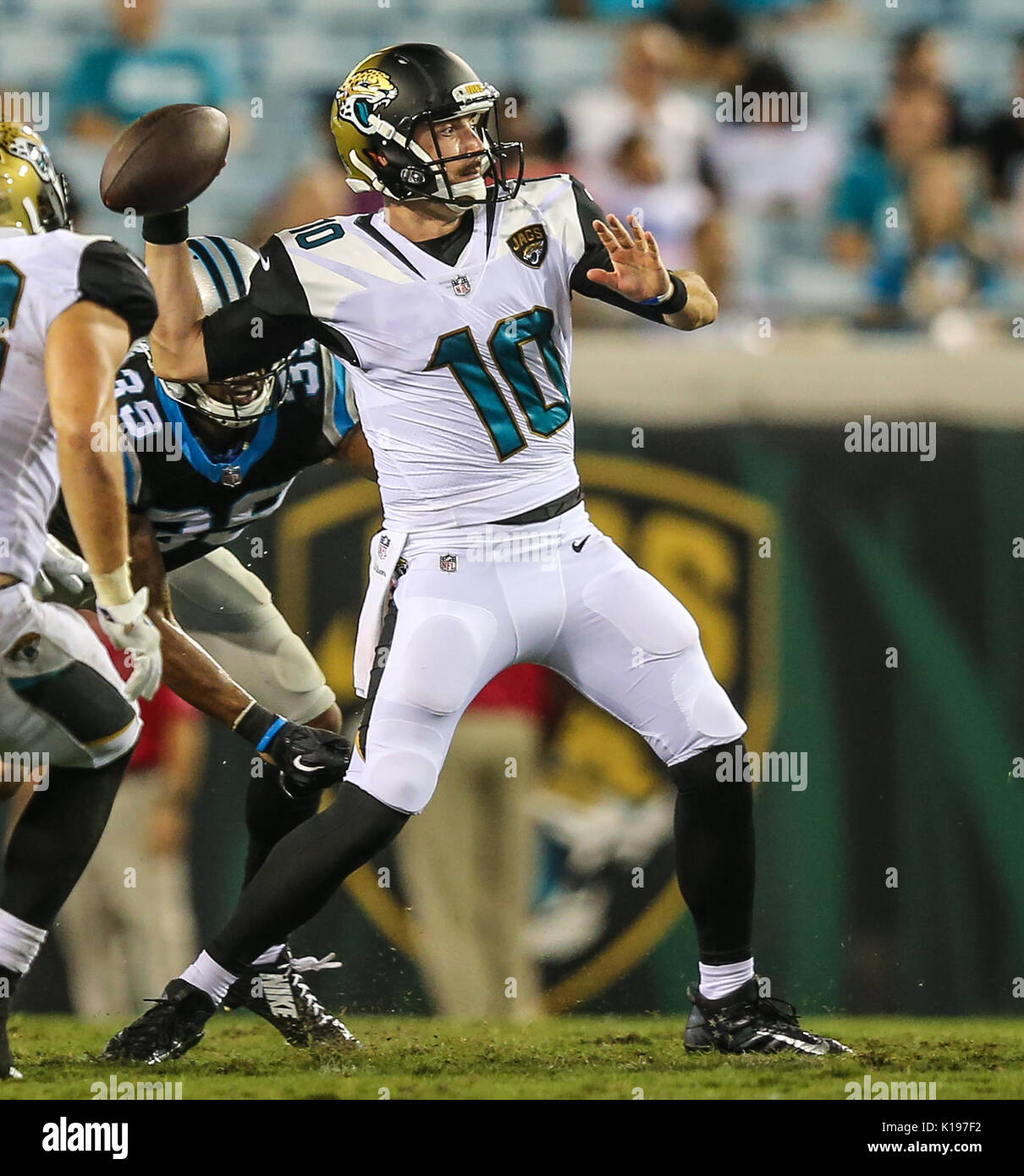 August 24, 2017: Jacksonville Jaguars wide receiver Justin Blackmon (14)  escapes Carolina Panthers cornerback Cole Luke (32) during a punt return in  the second half of an NFL preseason game in Jacksonville