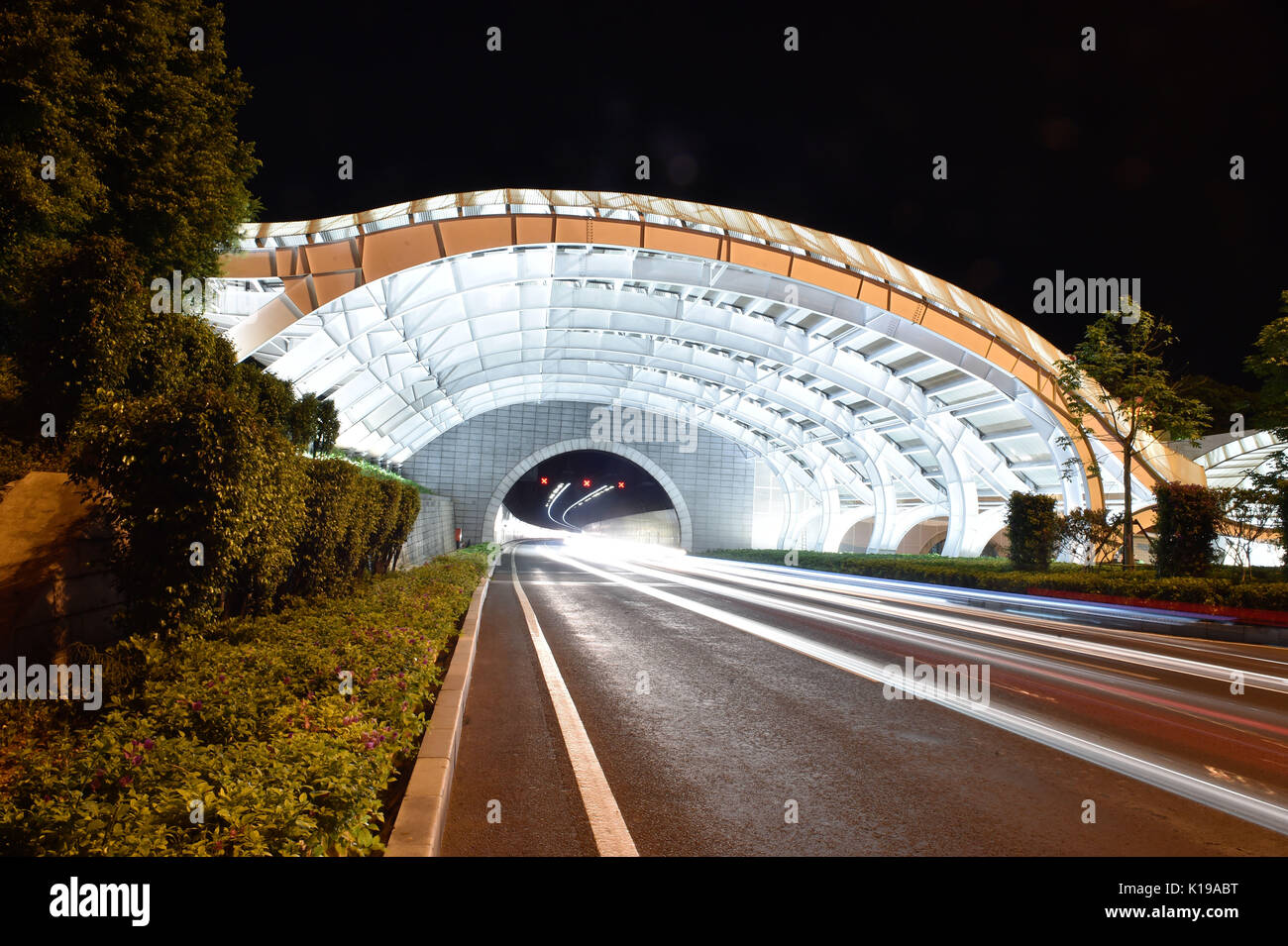 Xiamen. 25th Aug, 2017. Photo taken on Aug. 25, 2017 shows the lighting at the entrance of Xiang'an tunnel in Xiamen, southeast China's Fujian Province. Landscape lighting of four cross-sea bridges and an undersea tunnel linking Xiamen Island and the mainland in Fujian Province were lit up to greet the upcoming BRICS summit. Credit: Song Weiwei/Xinhua/Alamy Live News Stock Photo