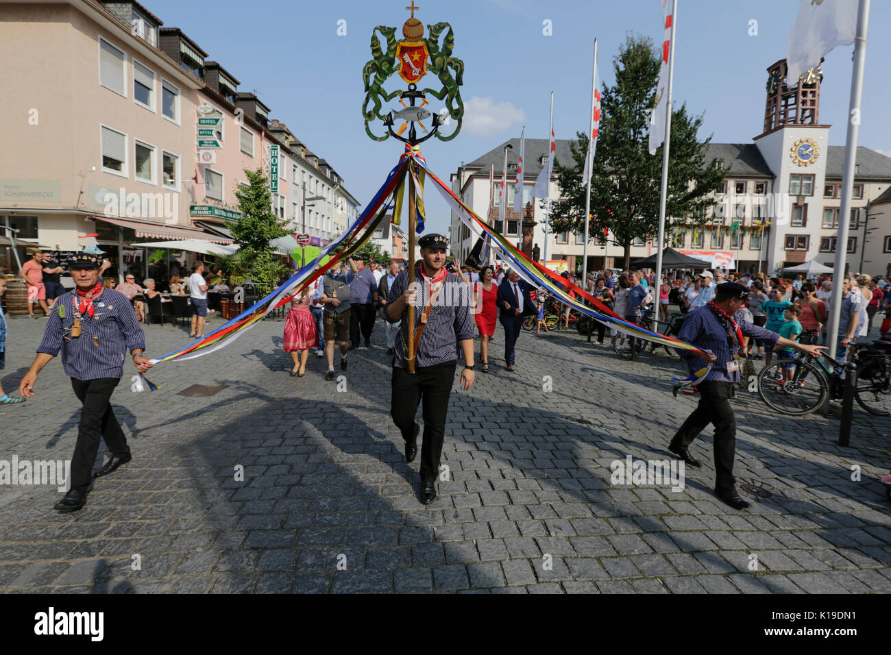 Worms, Germany. 26th August 2017. The representatives of the old fishermen's Guild of Worms march through the city centre of Worms. The largest wine and funfair along the Rhine, the Backfischfest started in Worms with the traditional handing over of power from the Lord Mayor to the mayor of the fishermen’s lea. The ceremony was framed by dances and music. Secretary of state Daniela Schmitt from the Rhineland-Palatinate ministry for economy, transport, agriculture and viticulture attended the opening Credit: Michael Debets/Alamy Live News Stock Photo