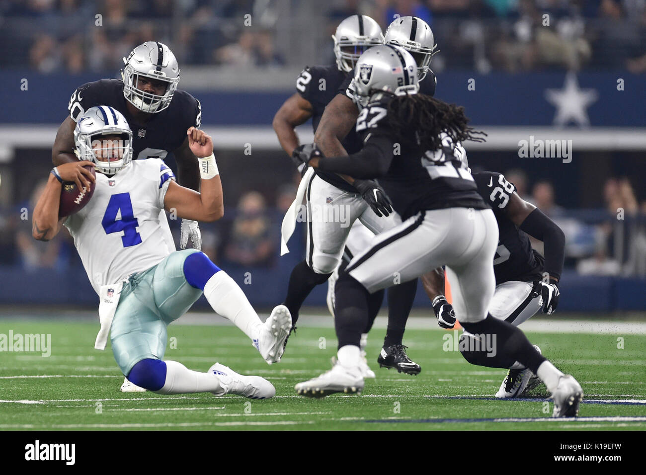 August 26, 2017: Dallas Cowboys quarterback Dak Prescott (4) warms up prior  to an NFL pre-season game between the Oakland Raiders and the Dallas  Cowboys at AT&T Stadium in Arlington, Texas. Shane