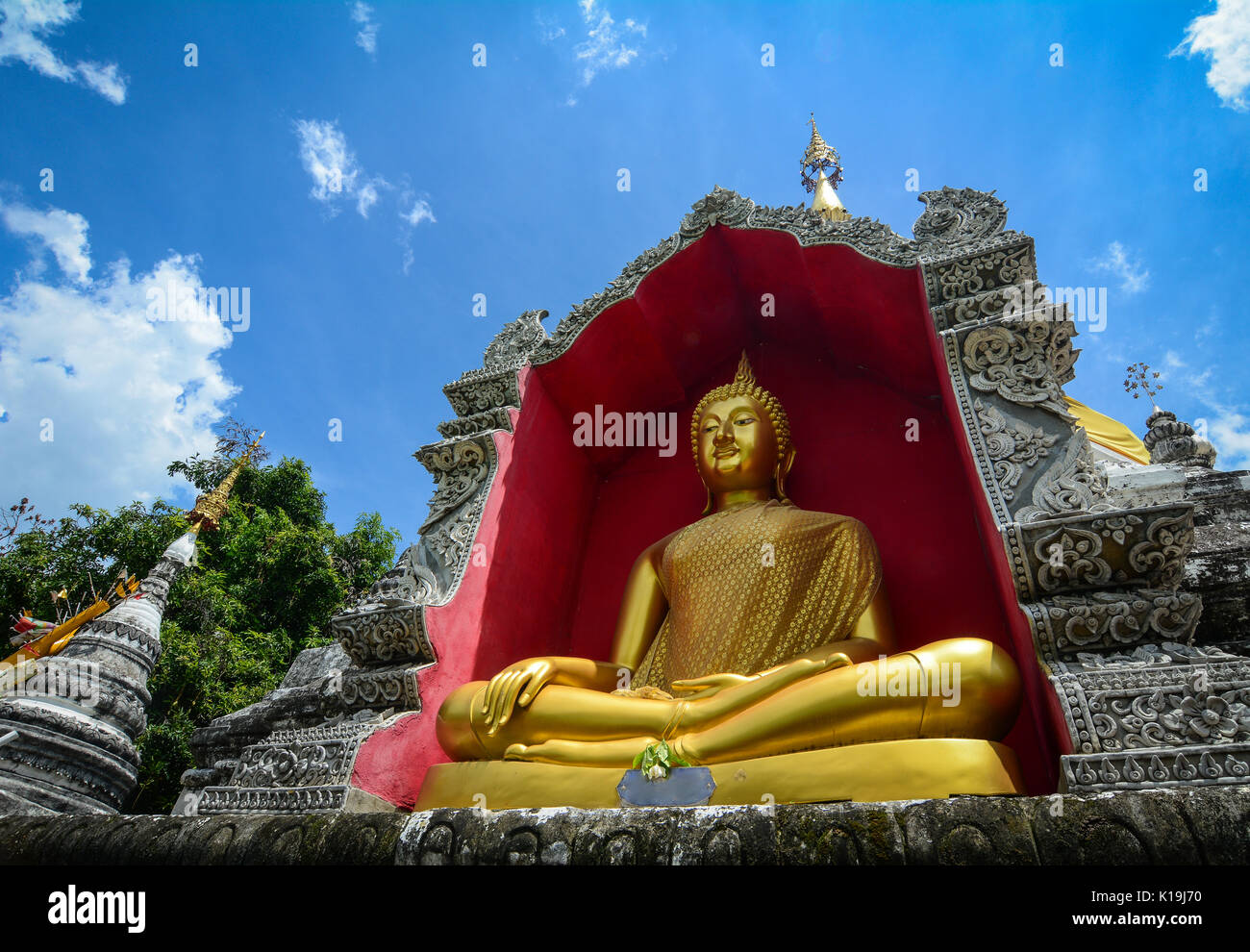 A golden Buddha statue at temple in Chiang Mai, Thailand. Chiang Mai ...