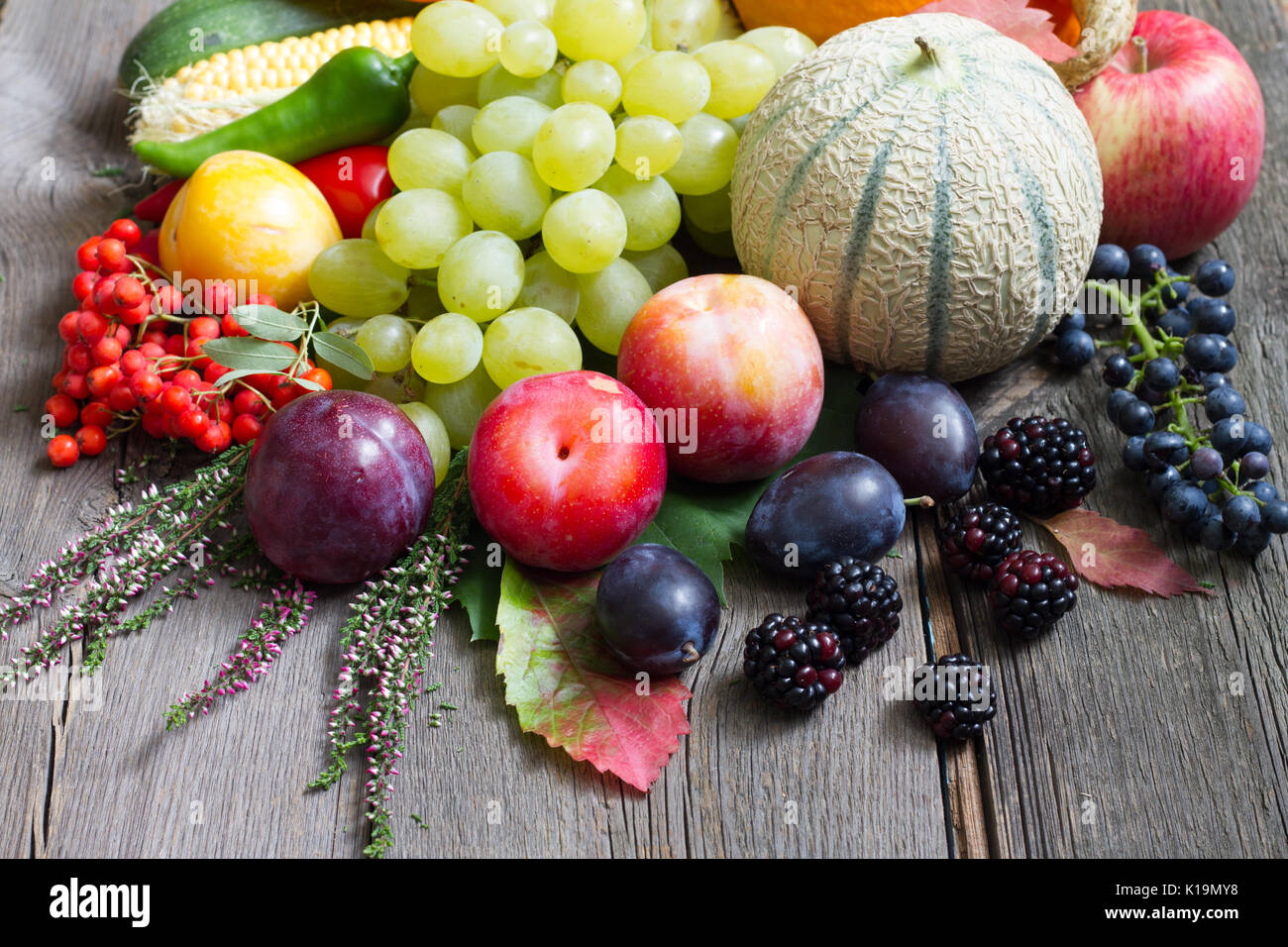 Autumn fruits and vegetables on wooden boards retro still life Stock ...