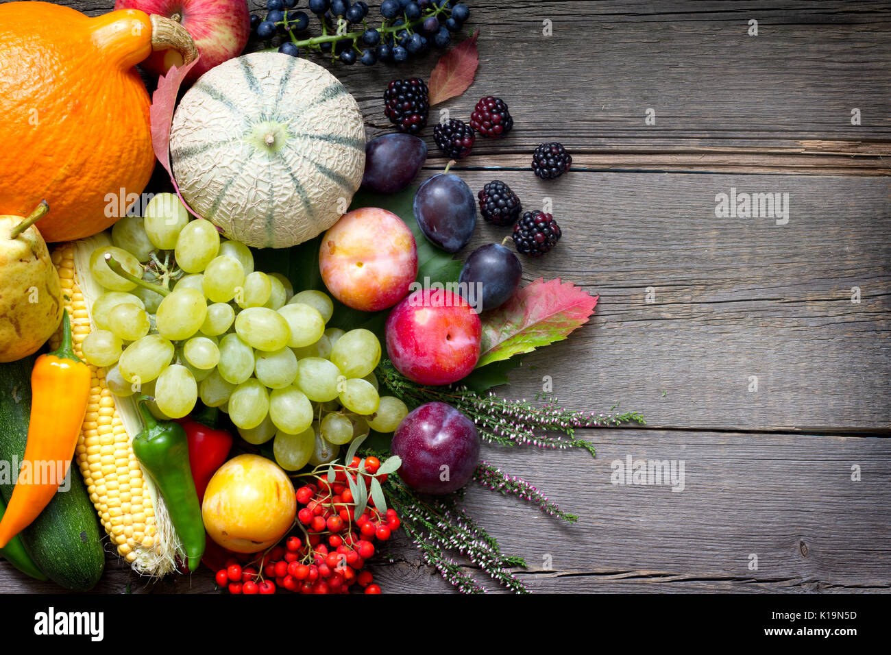 Autumn fruits and vegetables on wooden boards retro still life Stock ...
