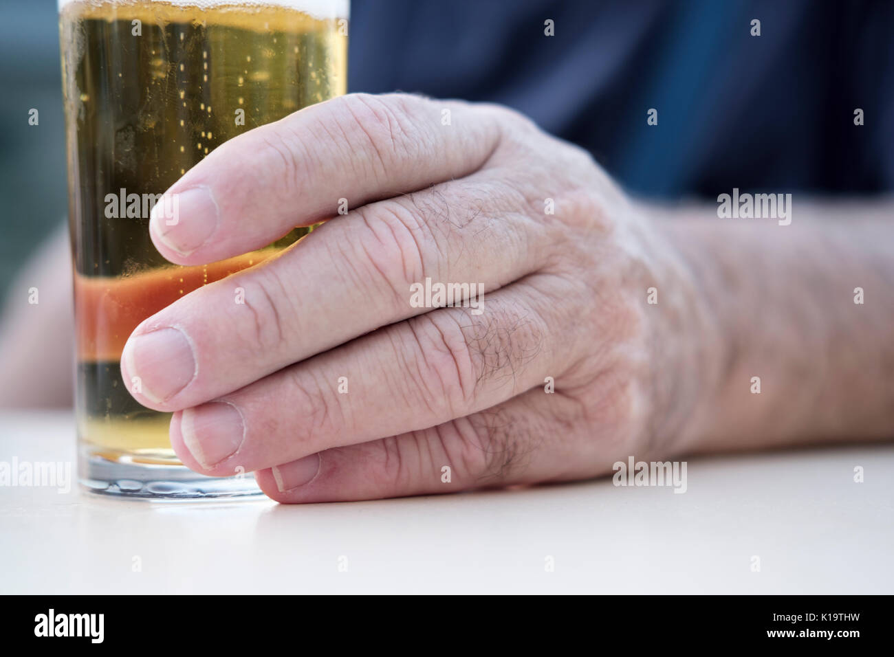 Man drinking a beer in Spanish town Stock Photo Alamy