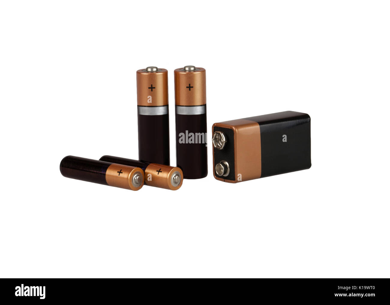 Five different batteries, type AAA, type AA, type PP3, on a white