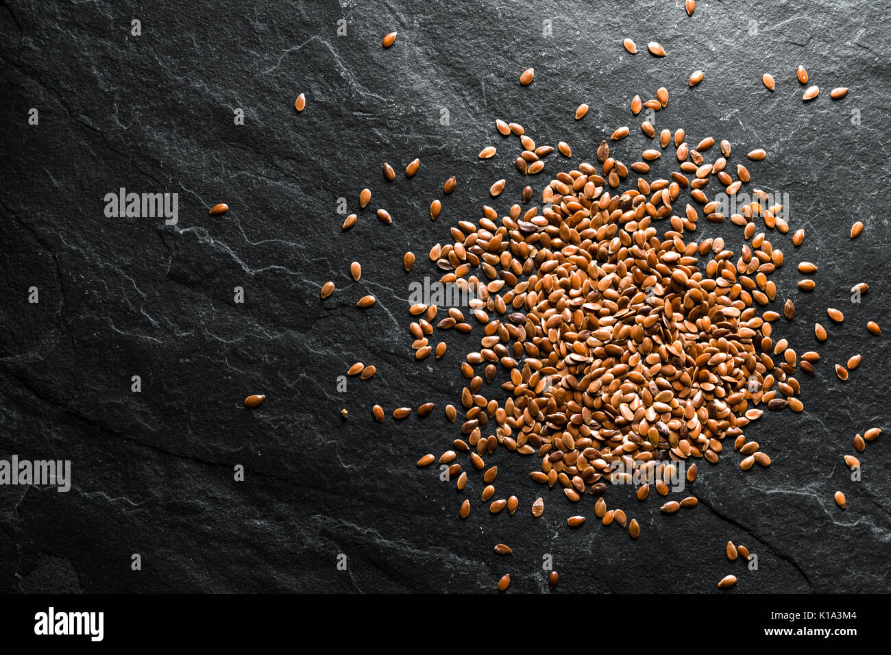 Flax seeds for germination on gray shale horizontal Stock Photo Alamy
