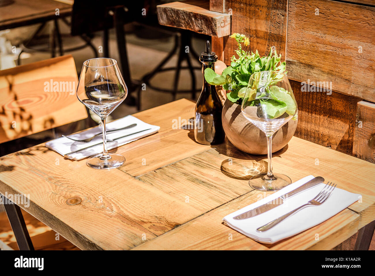 Table in the restaurant in the open air with glasses of wine. Stock Photo