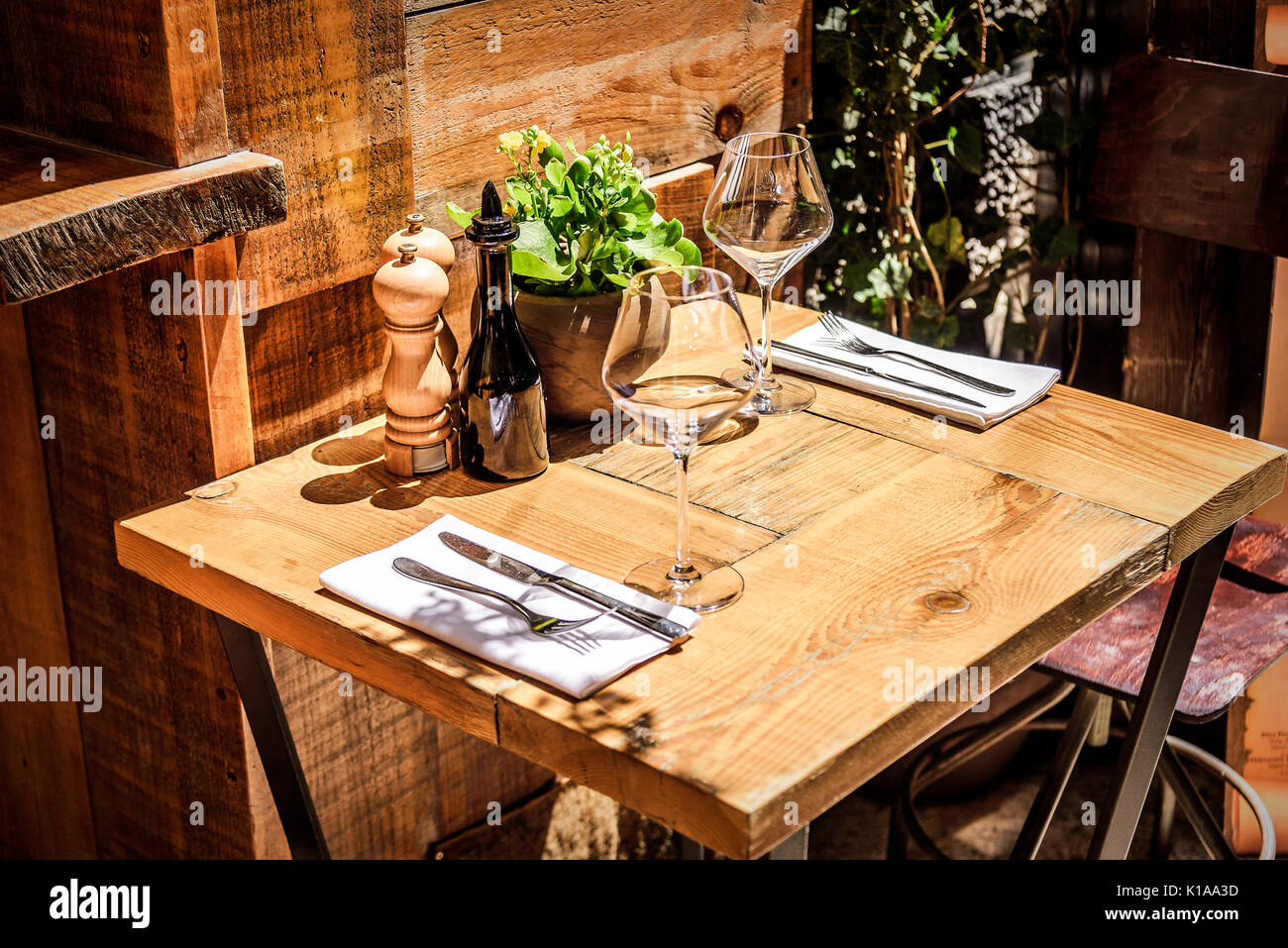 Table in the restaurant in the open air with glasses of wine. Stock Photo