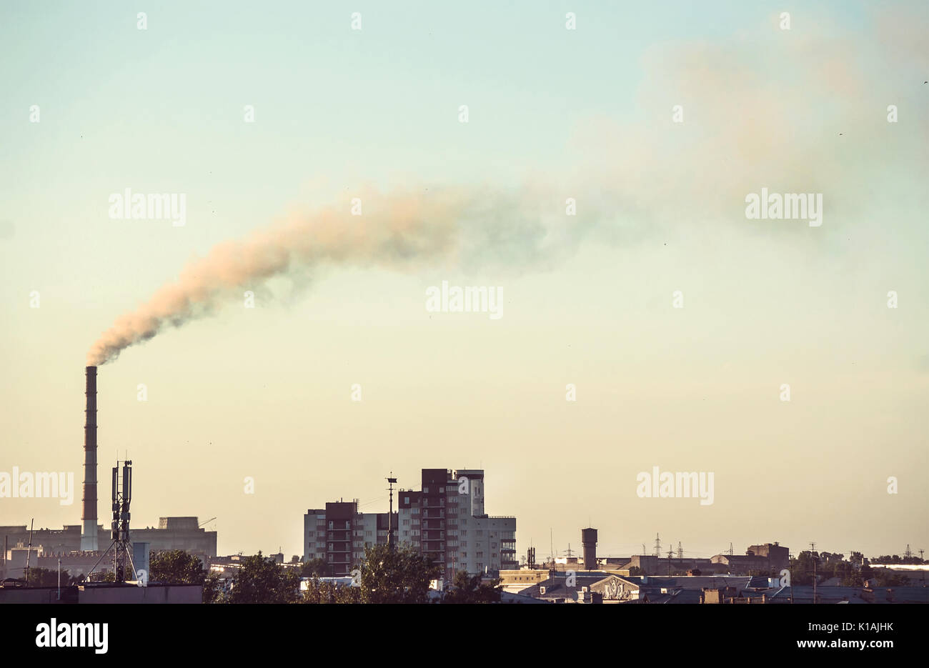 Smoke from factory pipes. Air pollution industry Stock Photo