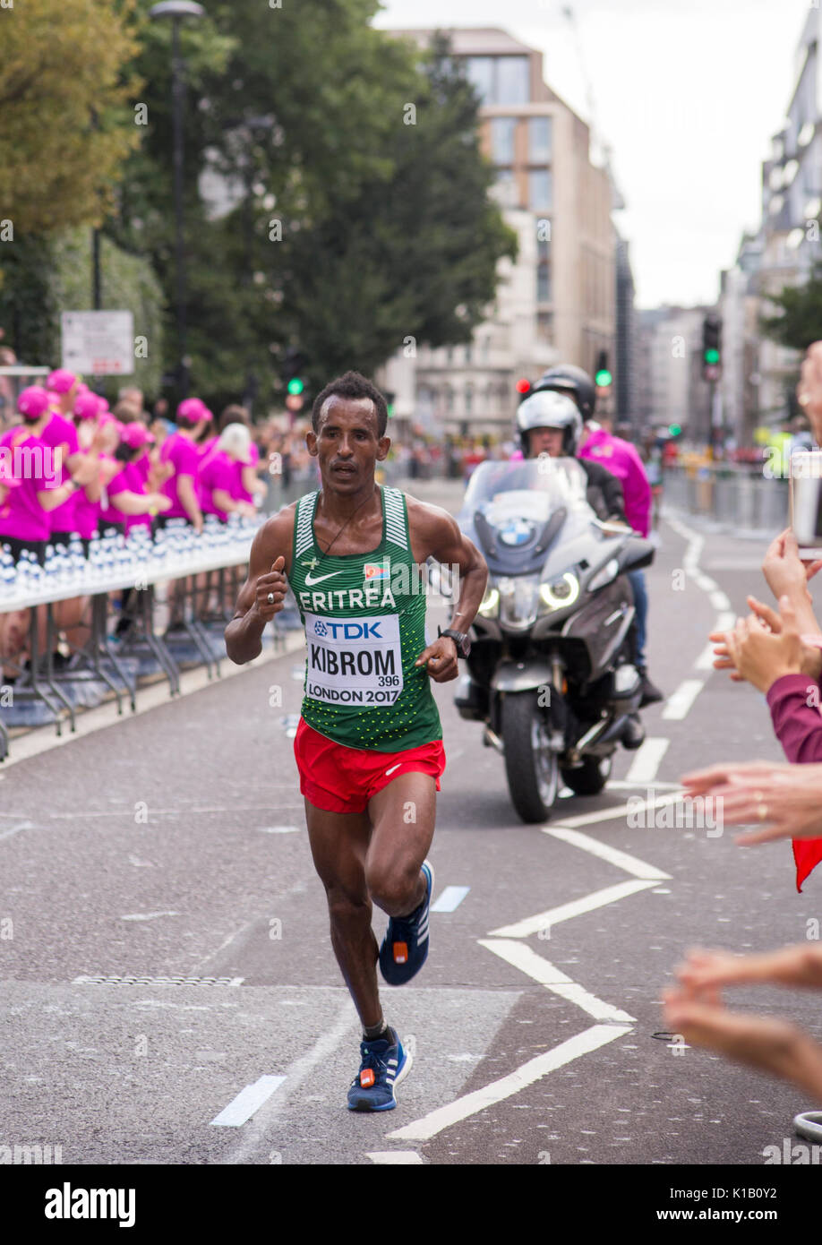 6 Aug '17 London: Eritrean Ghebrezgiaghier KIBROM passes water station during the IAAF 2017 World Athletics Championship men's marathon Stock Photo