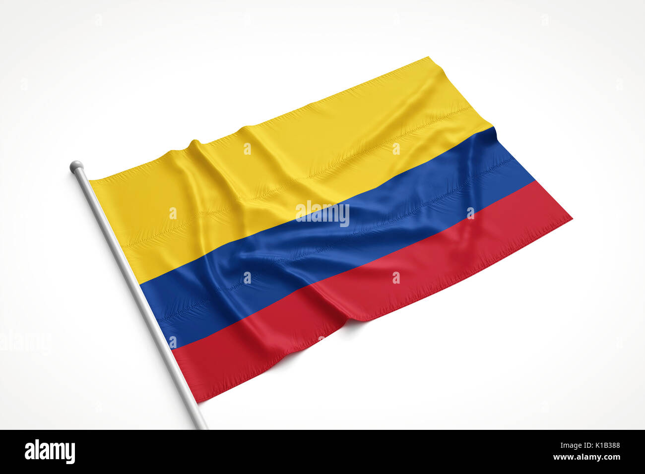 Colombian flag is laying on a white surface with flag pole attached. 3D Rendering. Stock Photo
