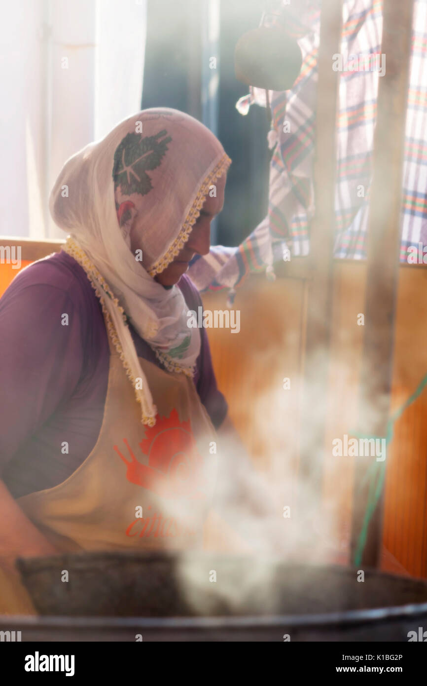 Turkish woman cooking traditional food Stock Photo