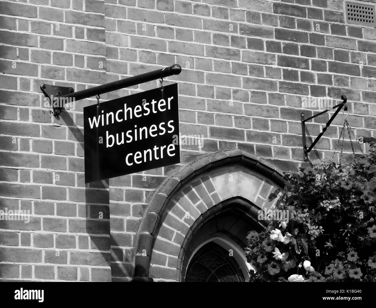 Business centre sign over premises, helping to promote and enhance businesses in the city Stock Photo