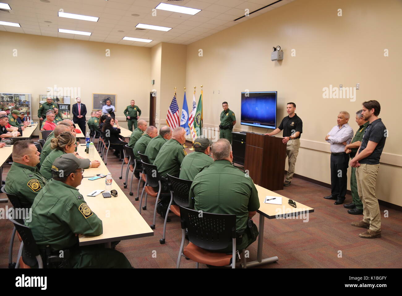 U.S. Customs and Border Patrol Acting Commissioner Kevin McAleenan speaks to staff during a visit to the Tucson Border Patrol Station August 21, 2017 in Tucson, Arizona. Stock Photo