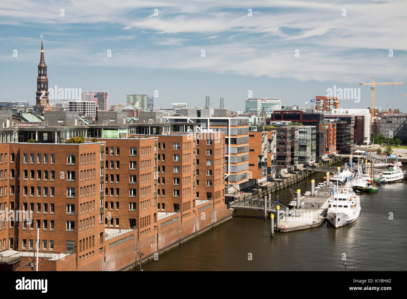 Waterside apartments on Sandtorhafen in the HafenCity quarter of Hamburg, Germany Stock Photo