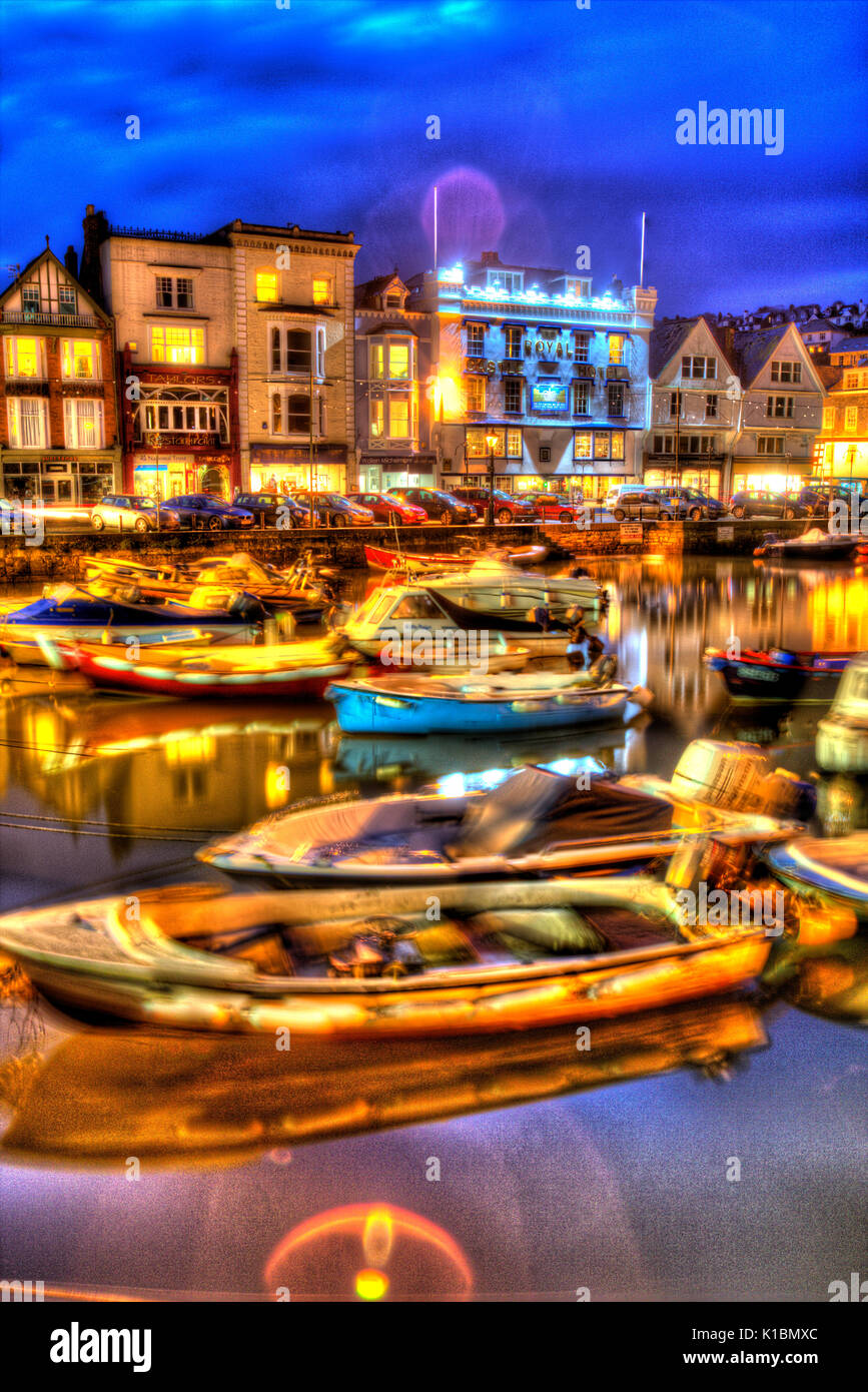 Town of Dartmouth, England. Picturesque evening view of fishing and leisure boats berthed at the Grade II listed Boat Float. Stock Photo