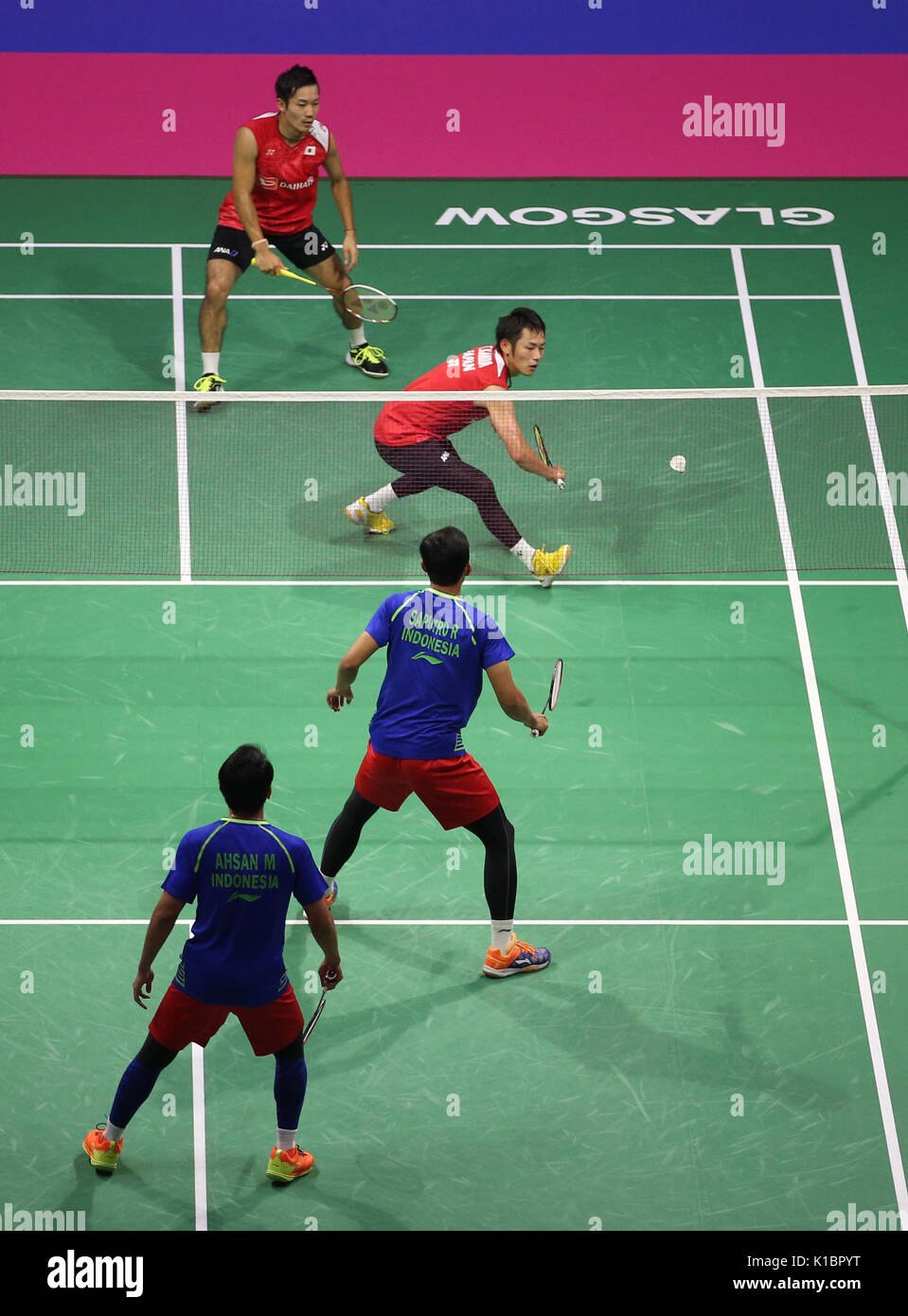 A general view of the main show court during the semi final of the mens doubles between (bottom) Indonesia's Mohammad Ahsan and Rian Agung Saputro and (top) Japan's Takeshi Kamura and Keigo Sonoda on day six of the 2017 BWF World Championships at the Emirates Arena, Glasgow. Stock Photo