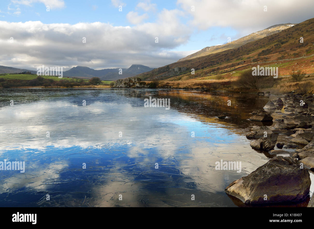 Llynnau Mymbyr are two lakes located in Dyffryn Mymbyr valley in Snowdonia and are here seen with mount Snowdon in the background. Stock Photo