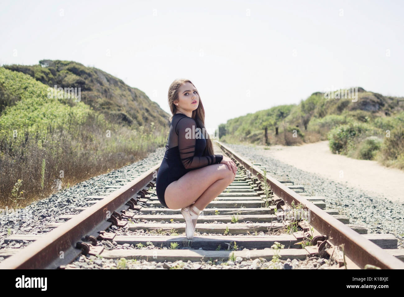 Dancer on the tracks Stock Photo