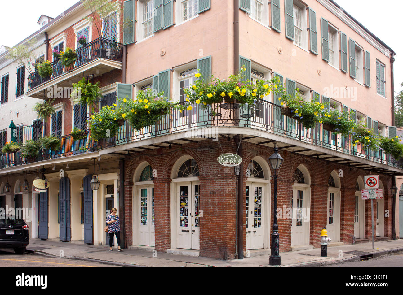 French Quarter building with retail below and apartments above, in