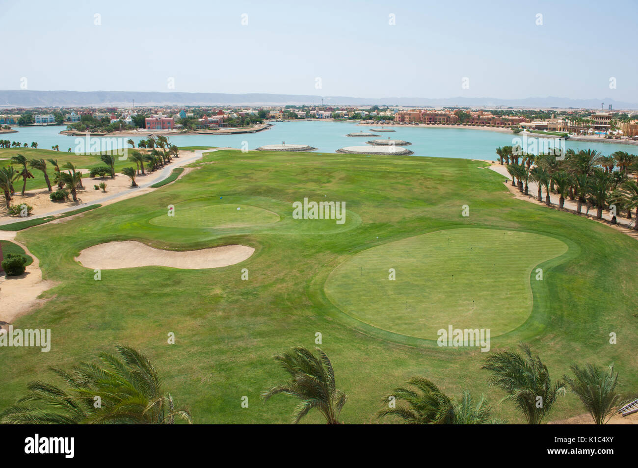 View of Panoramic aerial view over large lagoon with luxury waterfront villa ...