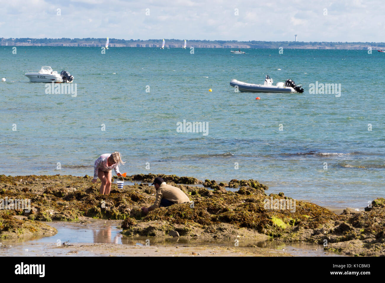 View of Noirmoutier island with sailing boats Stock Photo