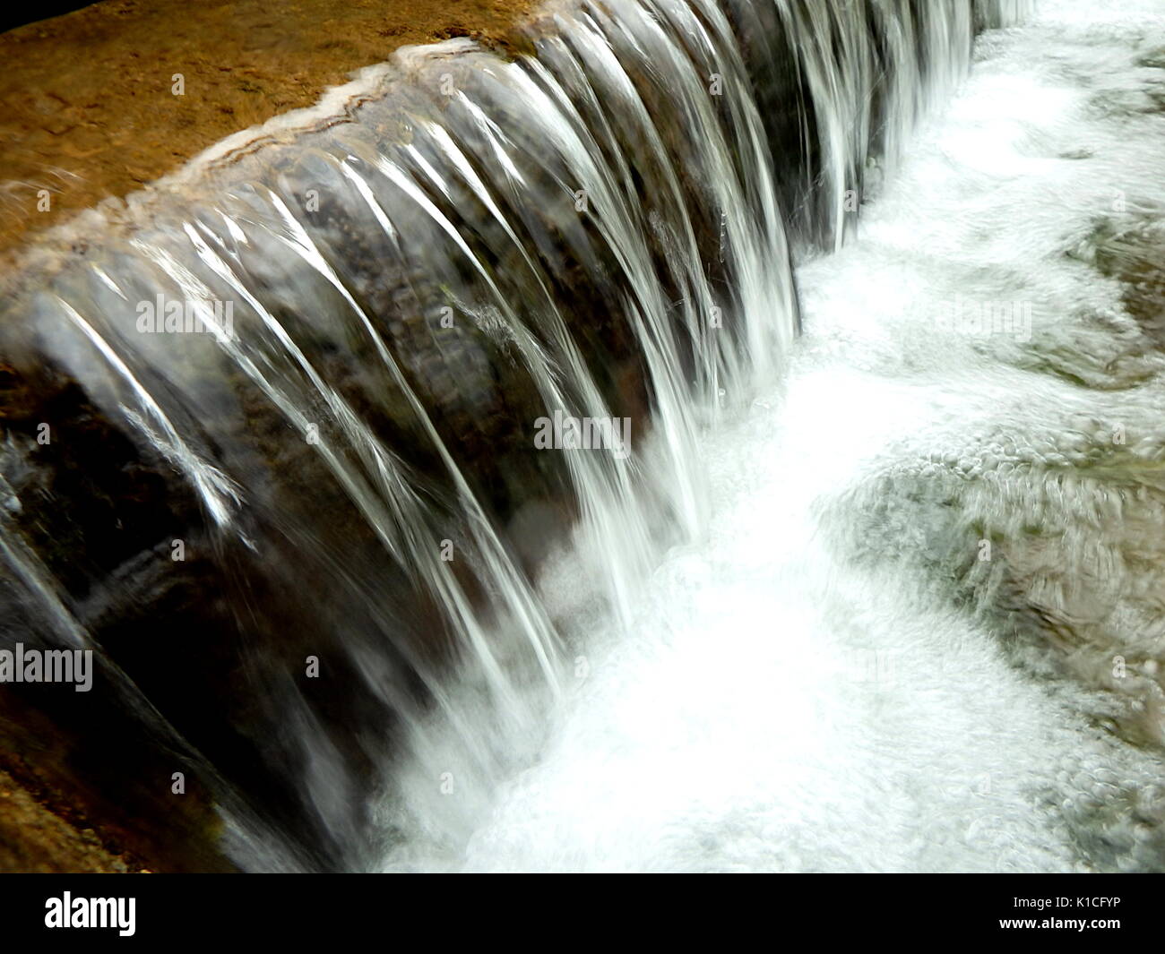 small waterfall, artificial cascade on the river, Stock Photo