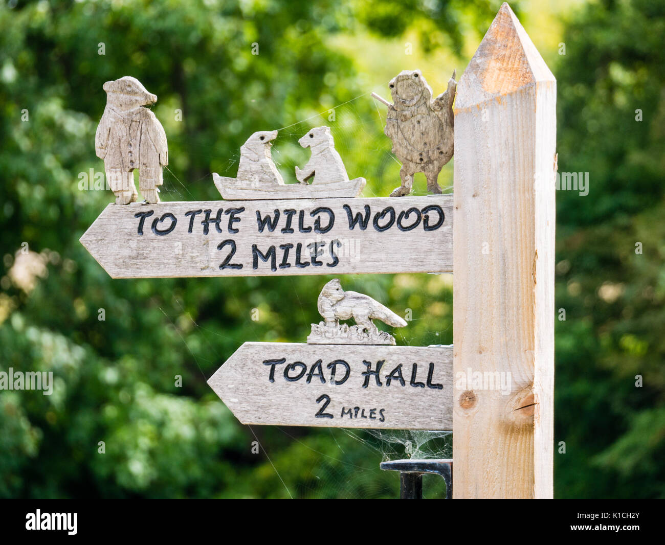 Signs Showing Directions to Locations from, Wind in The Willows, Purley on Thames, Berkshire, England, UK, GB. Stock Photo