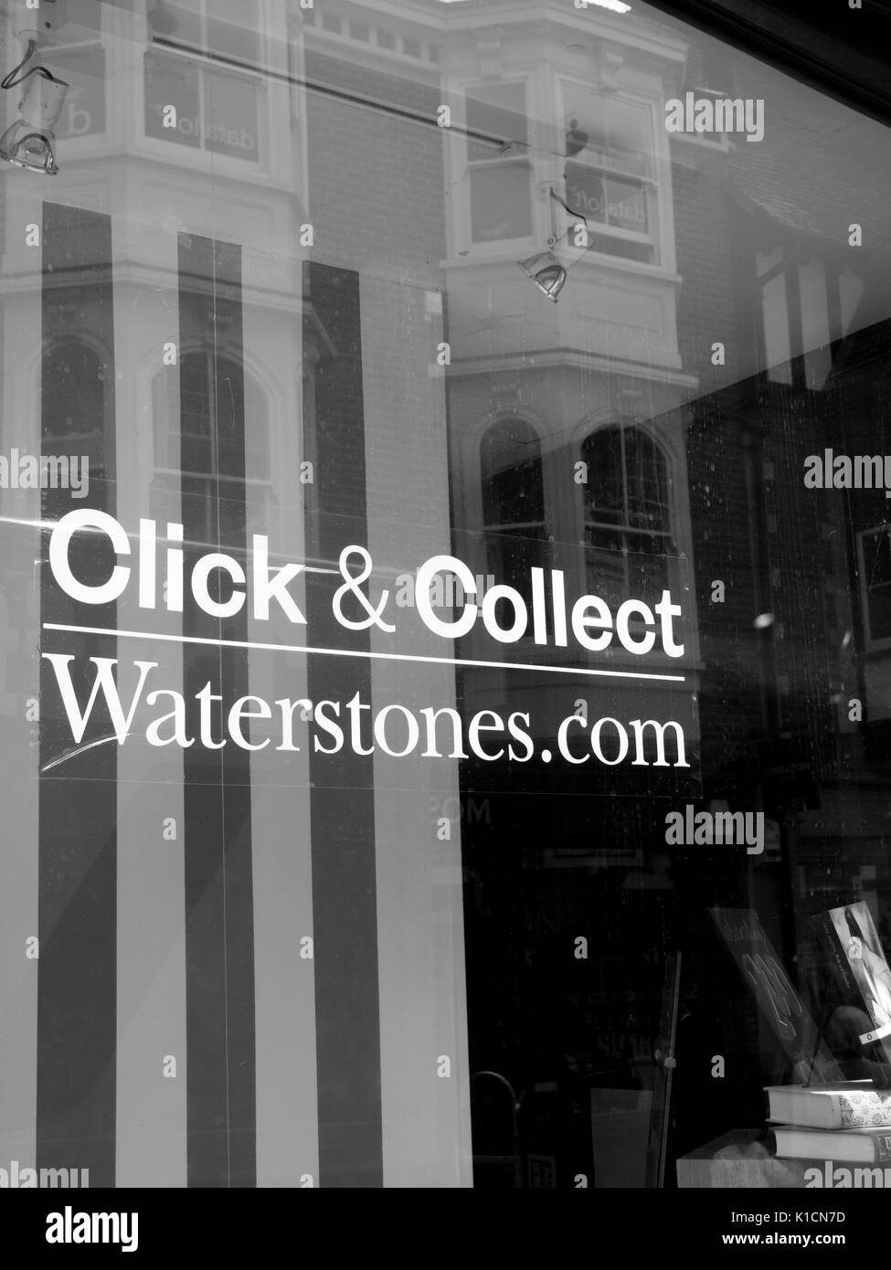 Waterstones click and collect sign in shop window, UK and Europe based