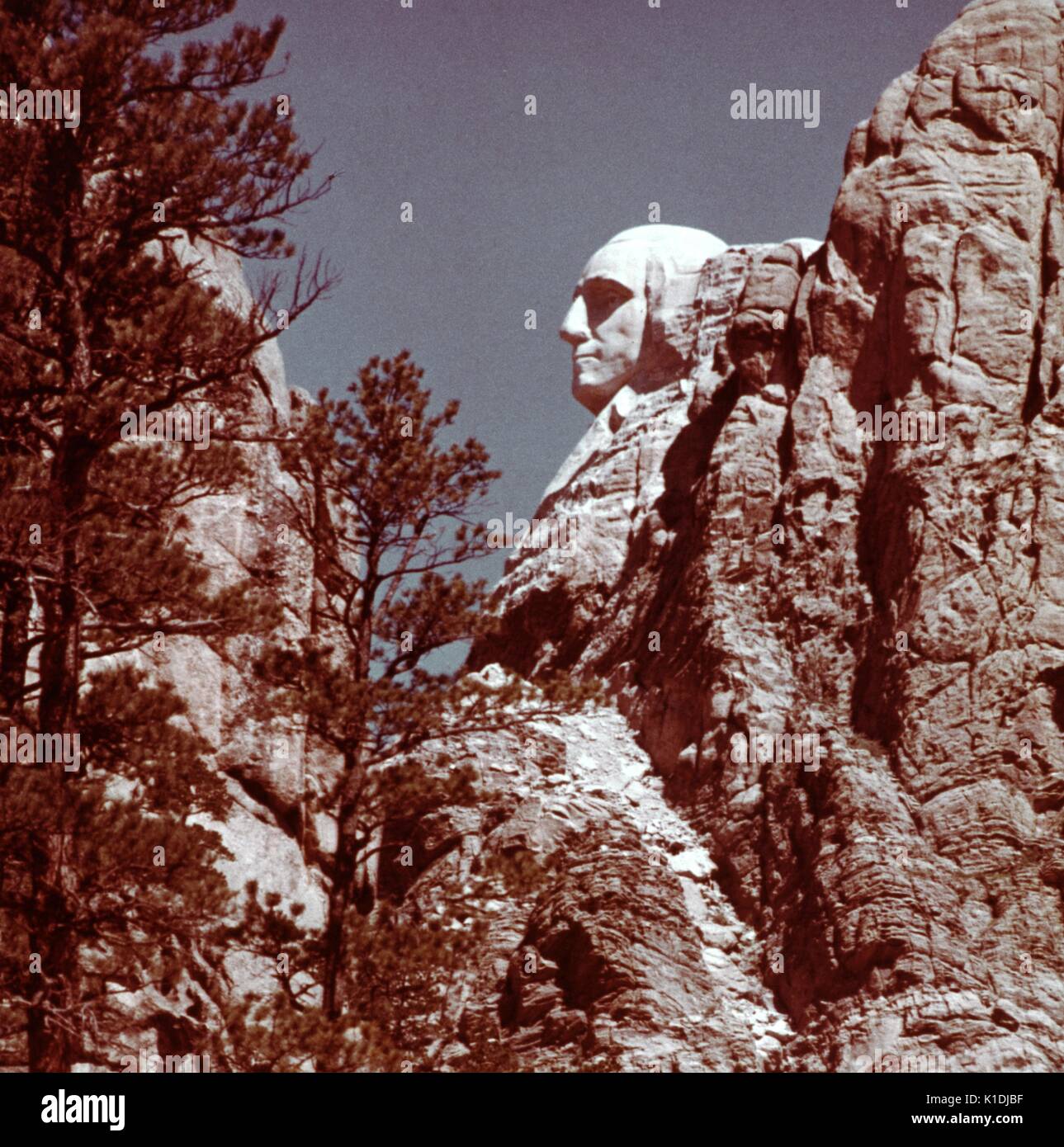 A profile view of George Washington's carving on Mount Rushmore, in the Black Hills in Keystone, South Dakota, 1975. Stock Photo