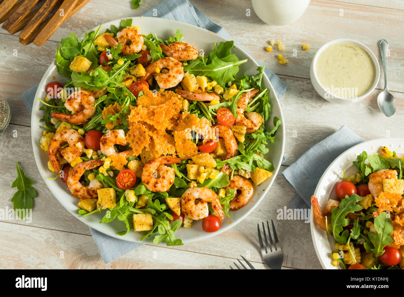 Homemade Arugula Shrimp and Polenta Salad wit Herby Dressing Stock Photo