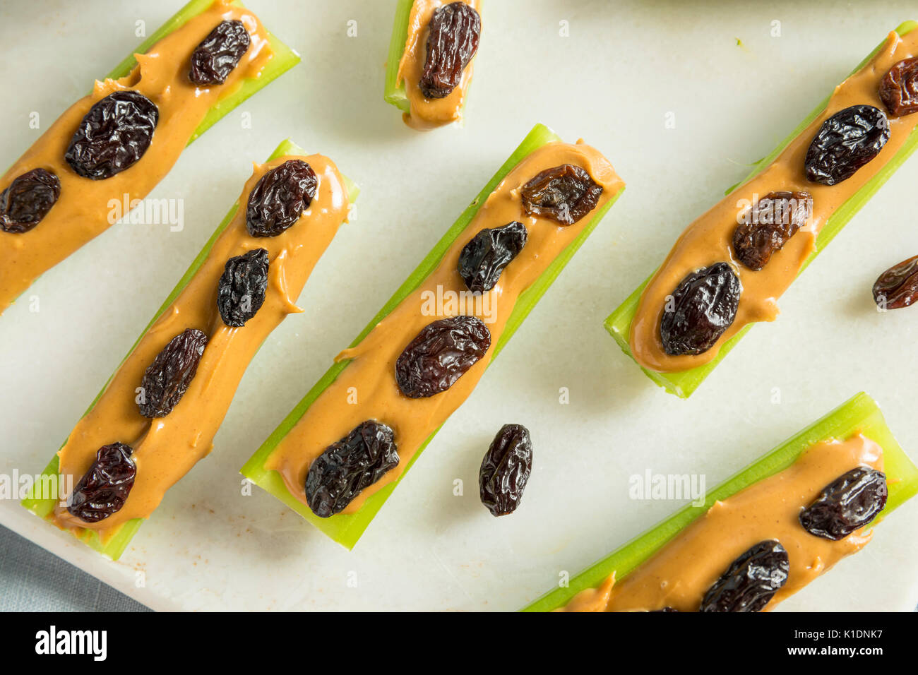 Homemade Ants on a Log Snack with Celery Peanut Butter and Raisins